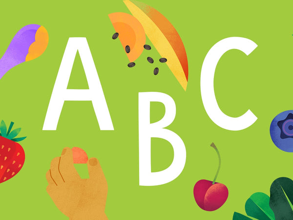 The letters A, B, and C on a green background, surrounded by illustrations of fruits and veggies