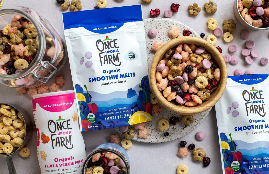 toddler trail mix in containers, next to Once Upon a Farm Smoothie Melts and Puffs containers