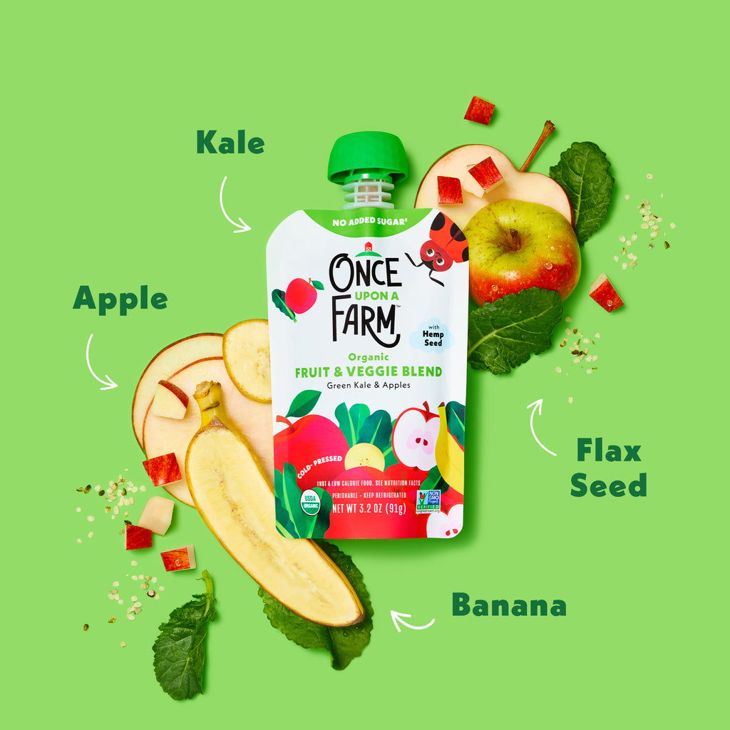 Once Upon a Farm Green Kale & Apples fruit and veggie blend pouch with kale, apple, banana, and flax seed elements on a green background