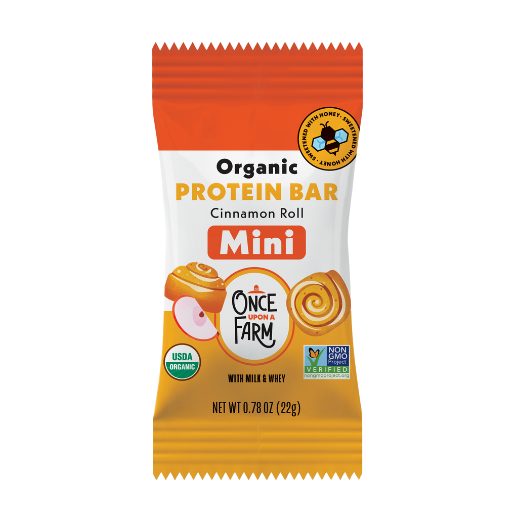 New Mini Cinnamon Roll Protein Bar package with orange and white design on a white background