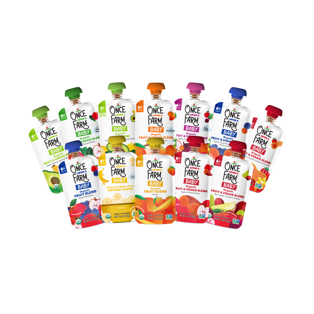 A group of Baby Starter Box Once Farm Baby & Toddler pouches arranged together on a plain white background, showing multiple flavor options with colorful labels and green caps.