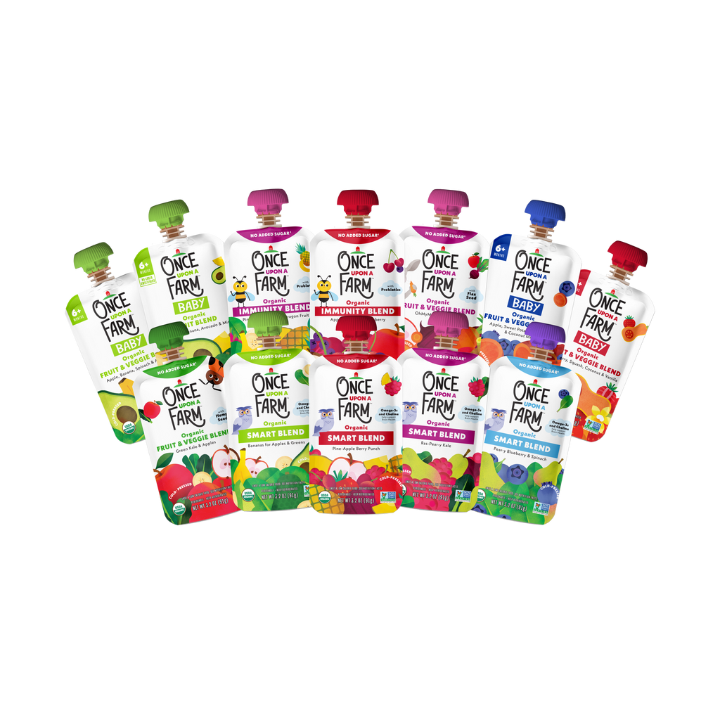 A group of Once Farm Family Favorites Starter Box pouches arranged together on a plain white background. The products include various fruit and vegetable blends with colorful labels and green, red, blue, and purple caps.