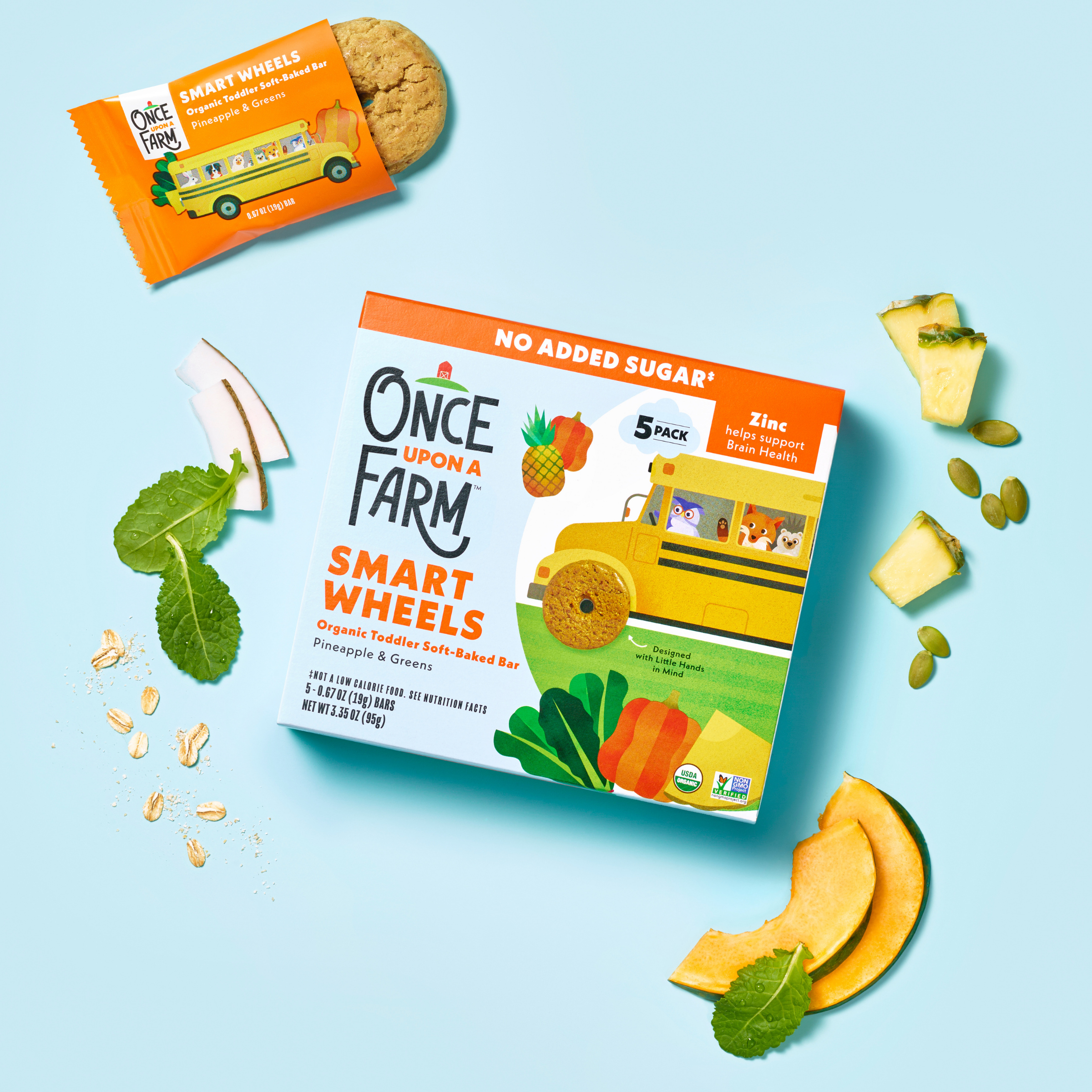 Box of 'Once Upon A Farm' Smart Wheels with snacks on a light blue background