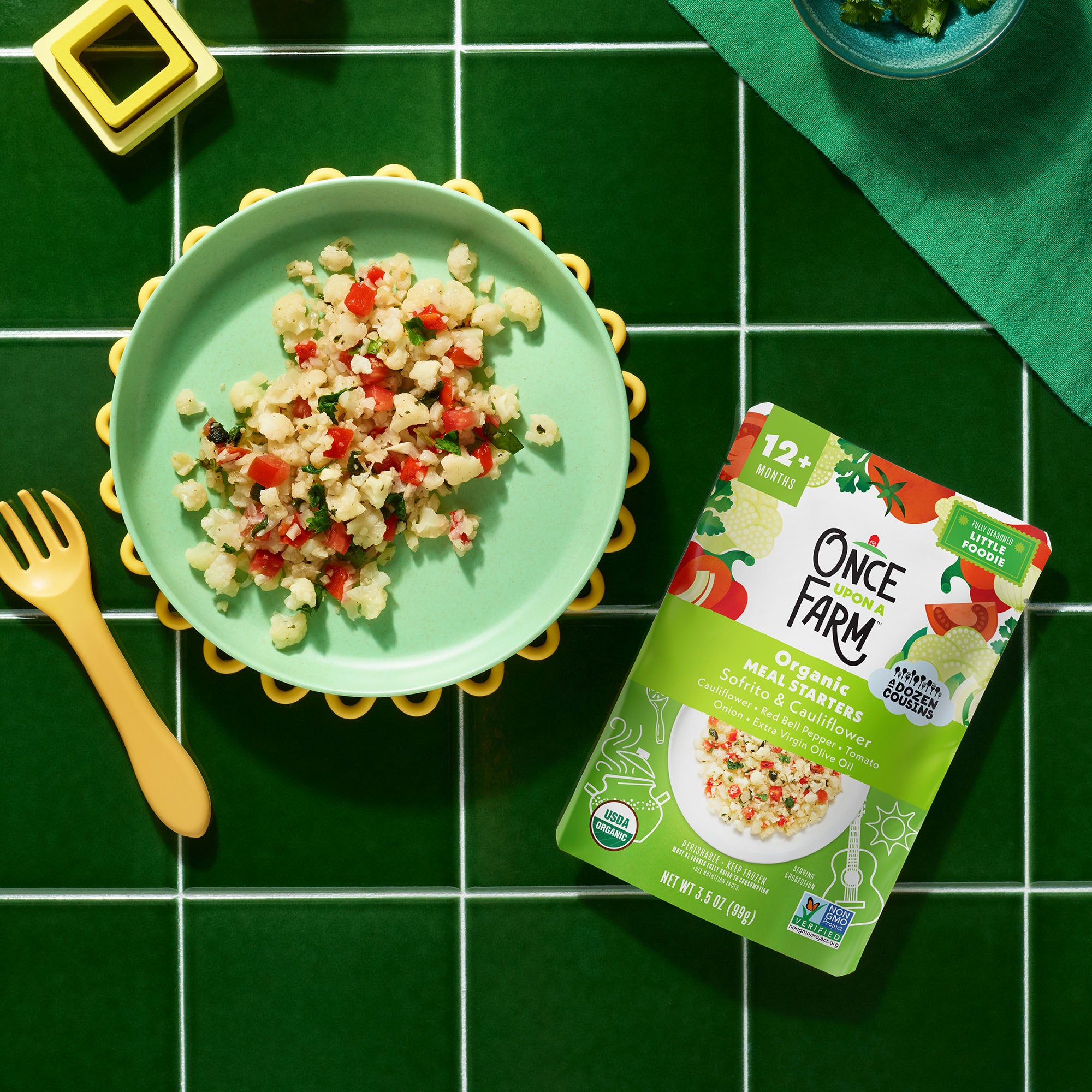 Sofrito & Cauliflower Frozen Meal packaging shown with cooked meal