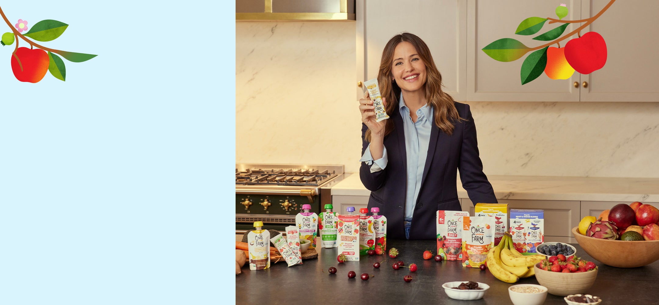 Once Upon a Farm Co-Founder Jennifer Garner poses with all Once Upon a Farm products including the new Refrigerated Oat Bar